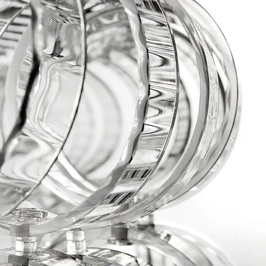 Exceptional Vistosi Ecos wall lamp crafted in clear glass with ridged concentric rings and a metal frame