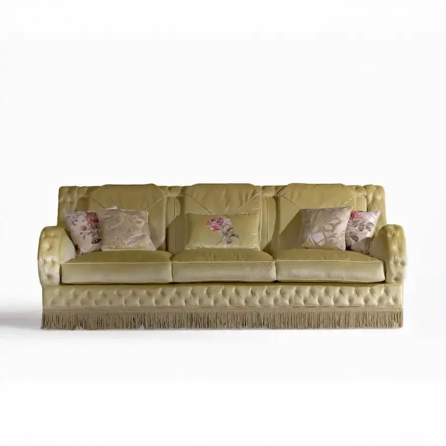 Lavish Armando Rho A1294 sofa upholstered in luminous green velvet with sculpted arms and ornate fringe detailing
