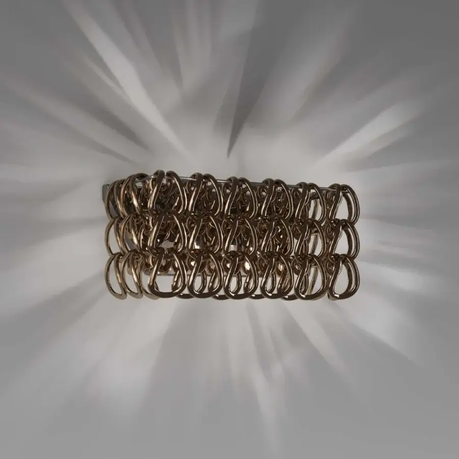 Distinguished Vistosi Giogali wall lamp crafted in interconnected links of shimmering gold-tone Murano glass with a polished reflective surface