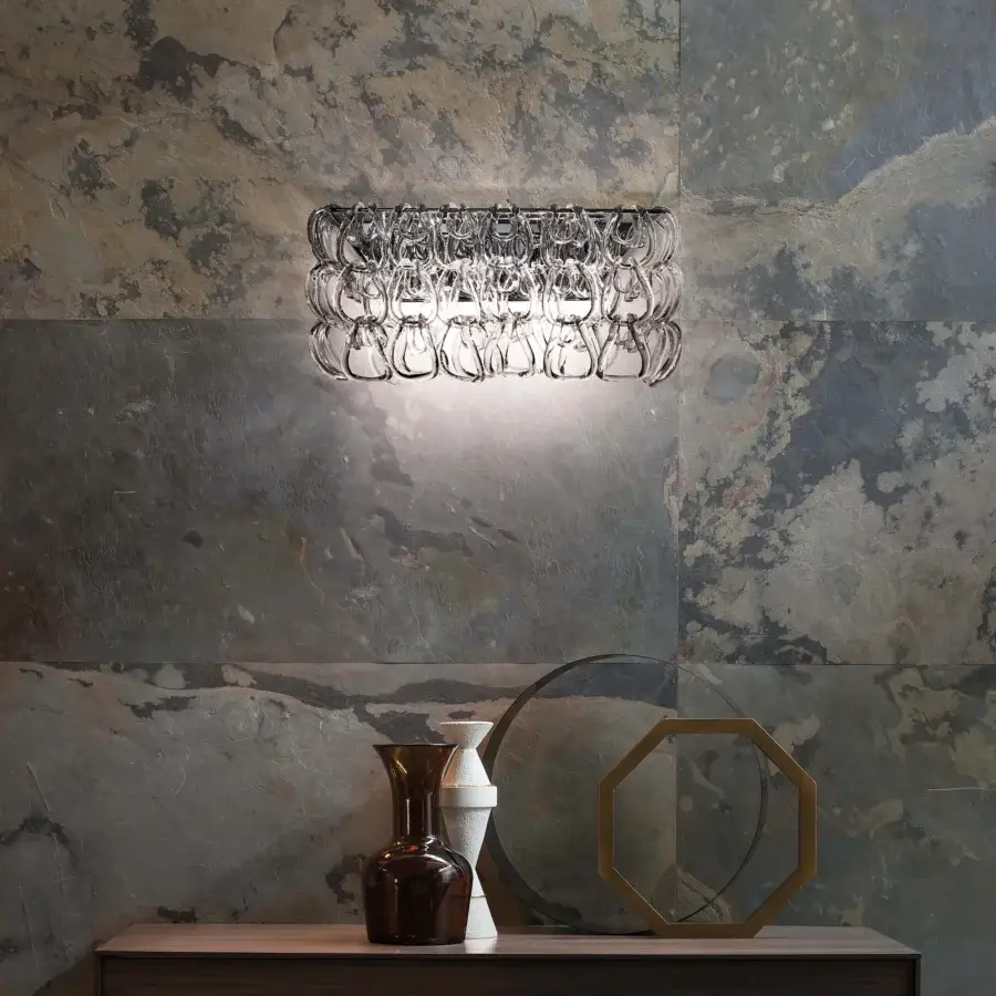 Exceptional Vistosi Giogali wall lamp crafted with interconnected Murano glass links and a polished metallic framework in a glossy finish