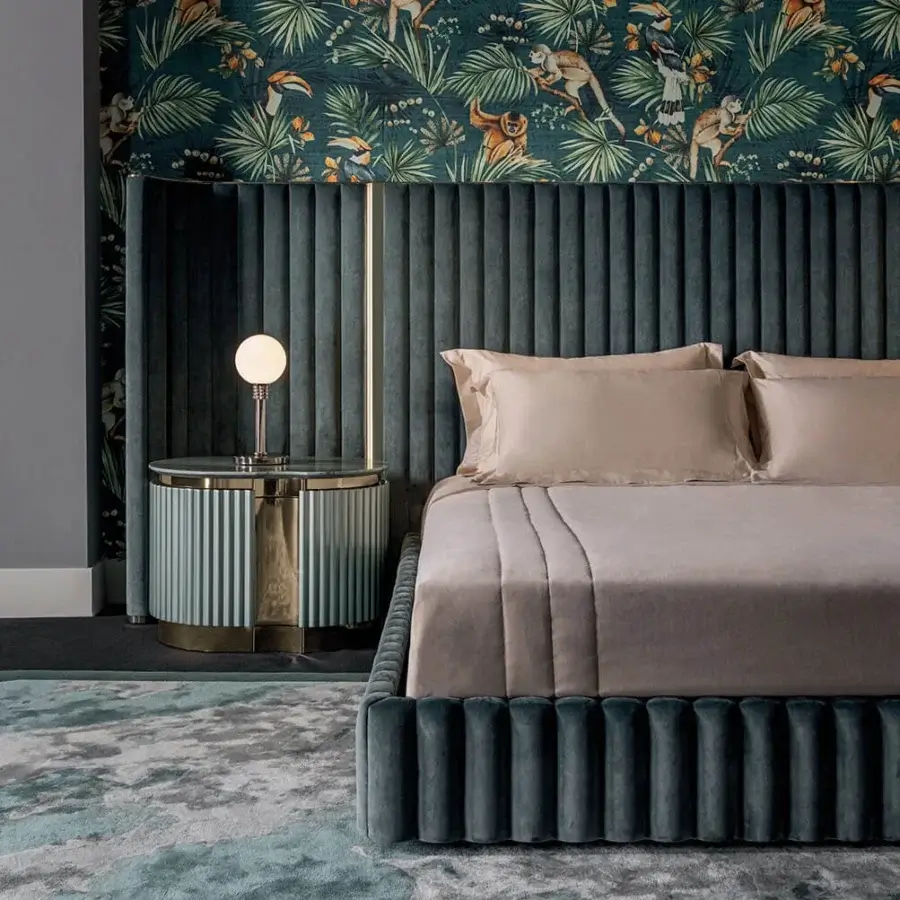 Lavish Visionnaire Leonardo nightstand in curved stainless steel with gold tone, canneté detailing and polished marble top