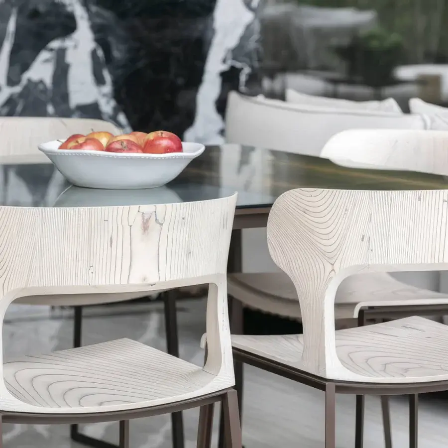 Exclusive Giorgetti Gea chair with a geometric carob powder-coated stainless-steel frame and refined birch plywood seat in a satin finish