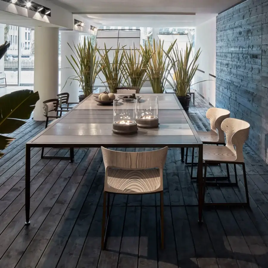 Distinguished Giorgetti Gea chair crafted with a geometric carob powder-coated stainless-steel frame and birch plywood seat