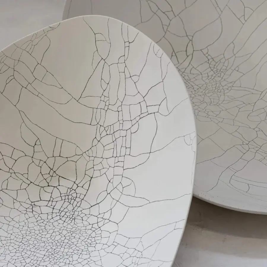 Superior Rina Menardi Baccelli centerpiece crafted in baked clay with a captivating matte finish and delicate crackle lines