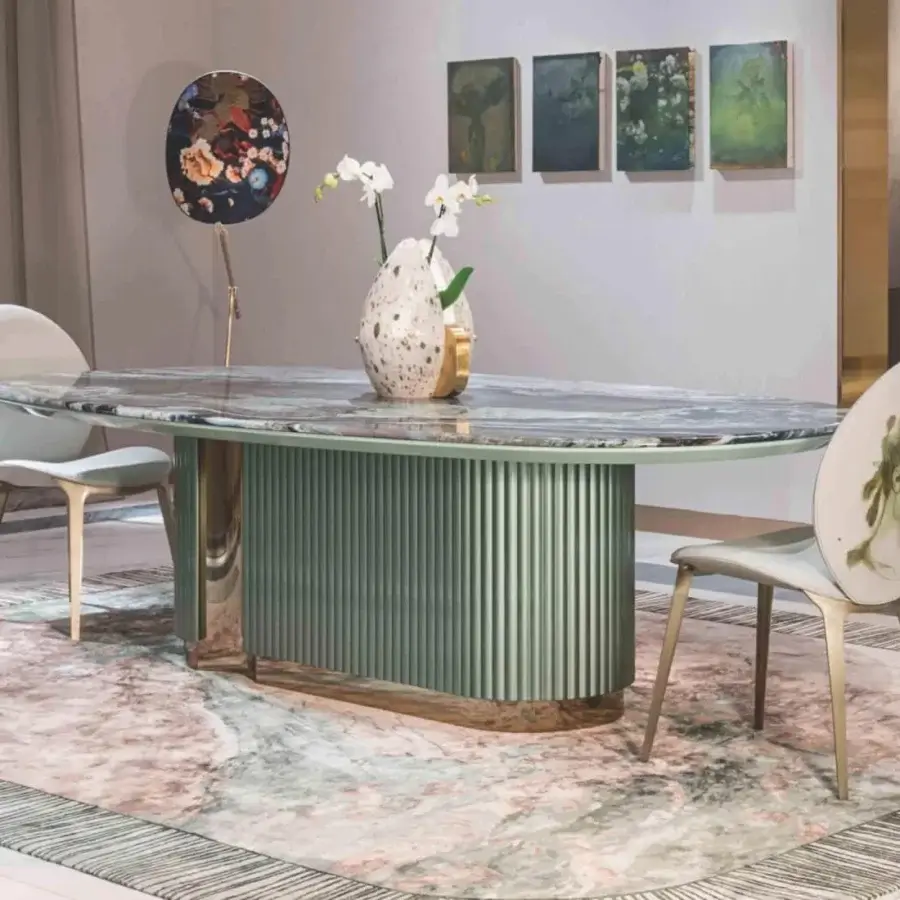 Superior Visionnaire Leonardo table with mottled gray and white marble and gold-toned metal, built with a sage green fluted base