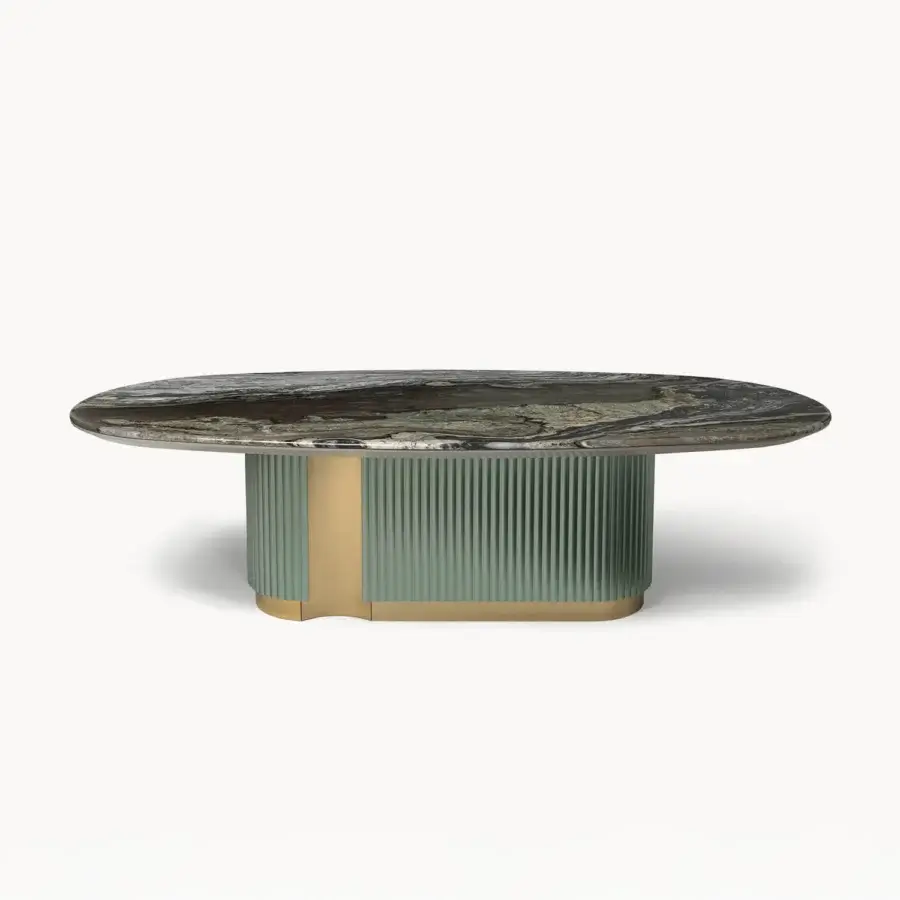 Lavish Visionnaire Leonardo table with a dark green and black marble top, sculpted sage green base and gold-toned metal accents