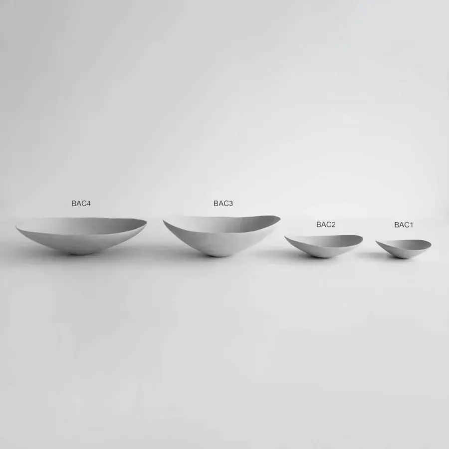 Exceptional Rina Menardi Baccelli centerpiece collection crafted in baked clay with a smooth matte grey finish
