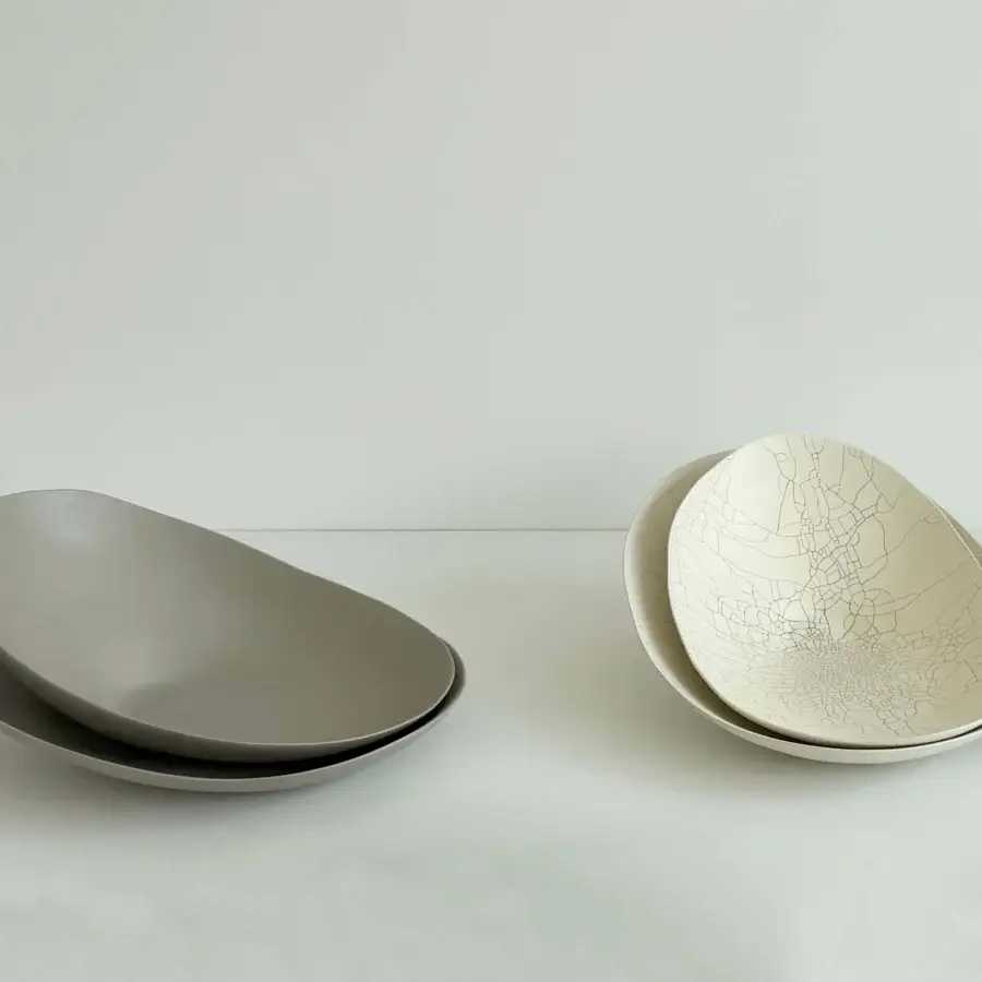 Distinguished Rina Menardi Baccelli Seduti centerpiece crafted in baked clay with a cool gray finish and organic form