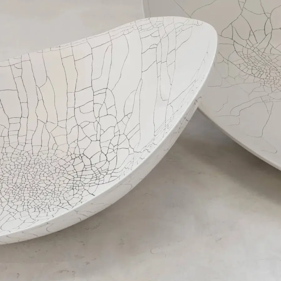 Exclusive Rina Menardi Baccelli Seduti centerpiece crafted from baked clay with a minimalist white finish and distinctive crazed effect