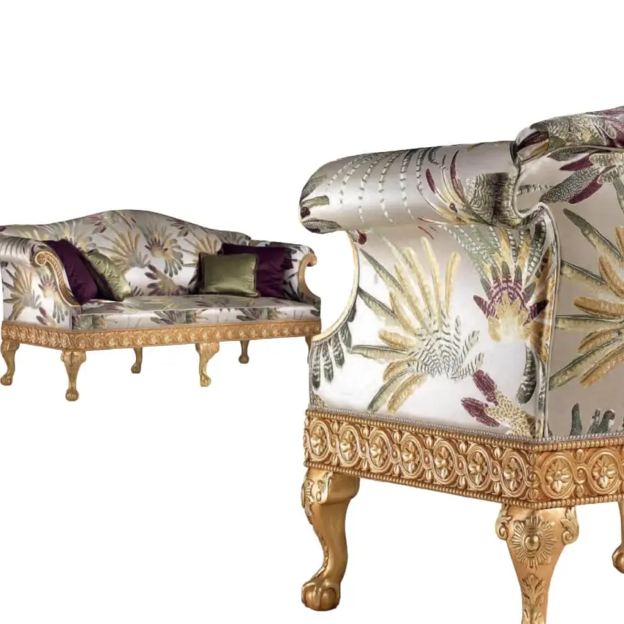 Distinguished Armando Rho A1267 sofa with botanical textile in shades of green, beige, and burgundy, plus entirely gold leaf-finished sculpted wood