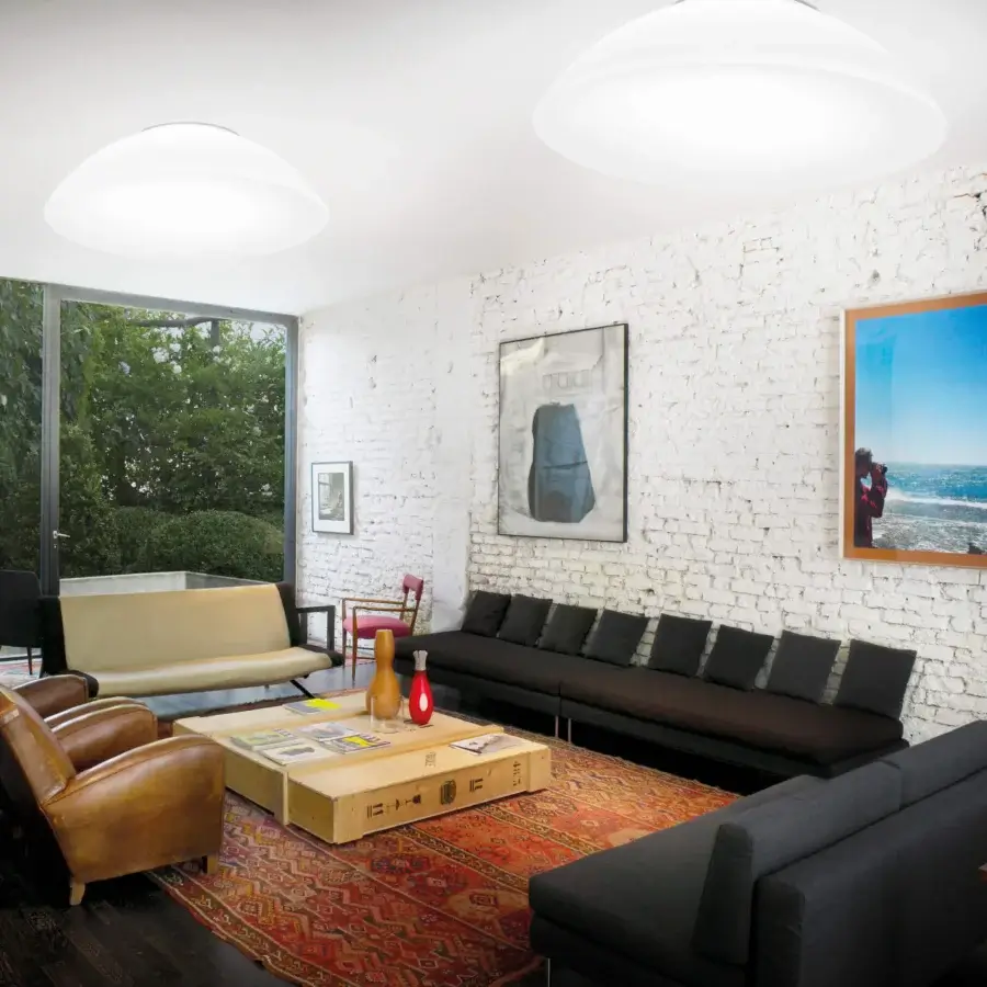 Distinguished Vistosi Infinita ceiling lamp crafted in Murano glass with a matte white finish emitting ambient glow