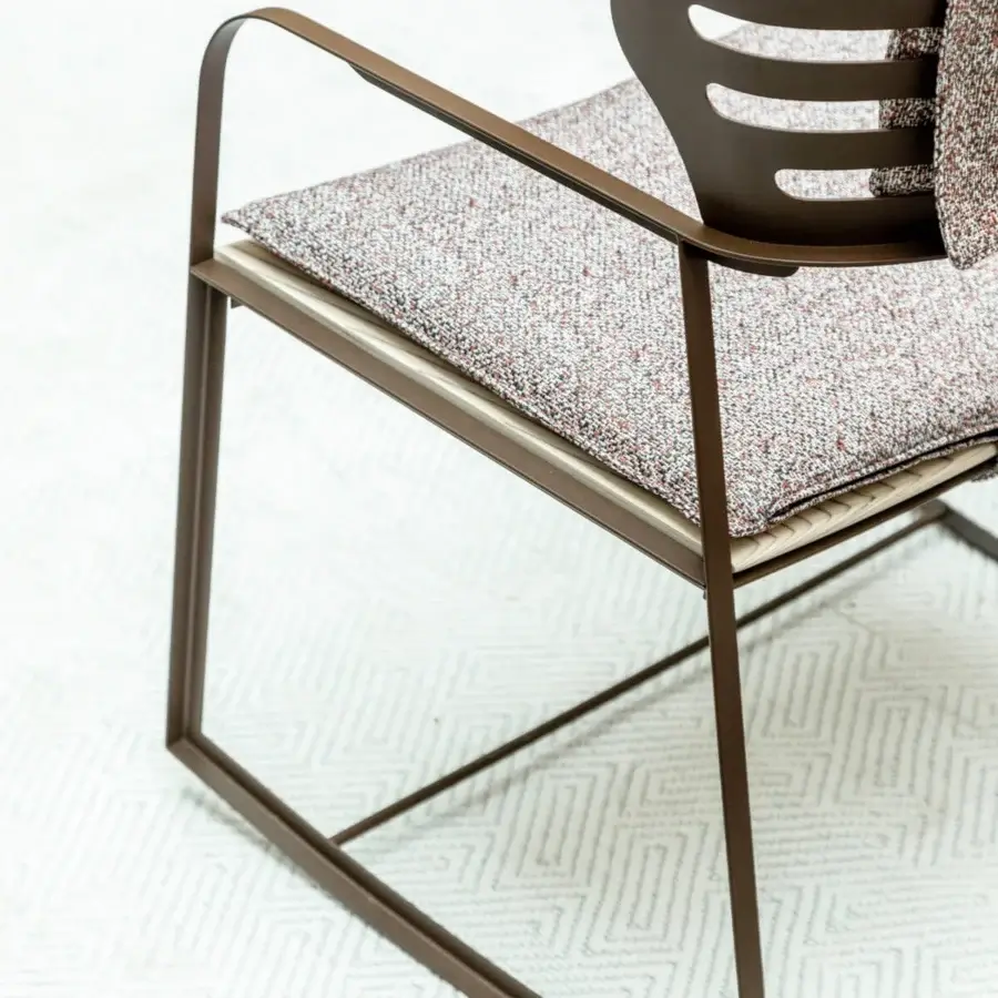 Sophisticated Giorgetti Gea rocking lounge chair with a geometric stainless steel frame in carob finish and richly textured textile upholstery