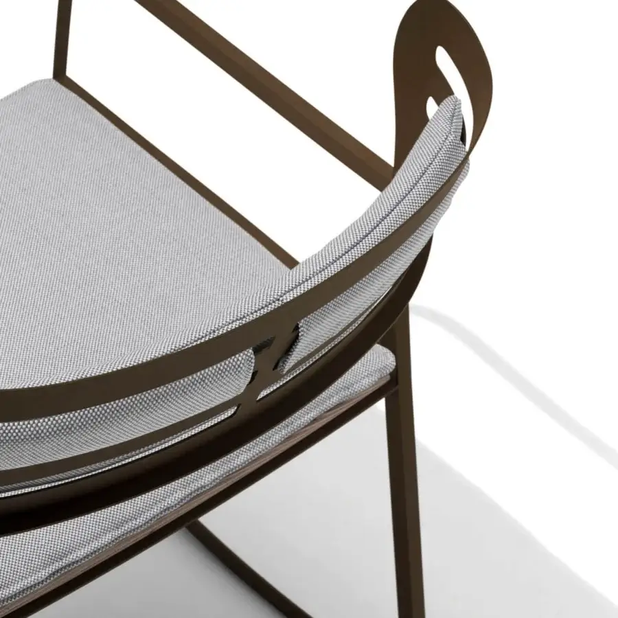 Sophisticated Giorgetti Gea rocking lounge chair with a geometric carob stainless steel frame and light-grey patterned cushions crafted in birch