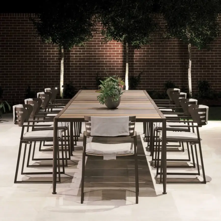 Distinguished Giorgetti Gea armchair with a geometric stainless steel frame in carob finish and contoured birch seat crafted for serene comfort