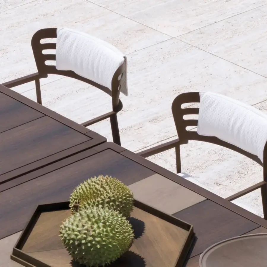 Exceptional Giorgetti Gea armchair with a geometric stainless steel frame in carob and light beige textile upholstery crafted with birch wood