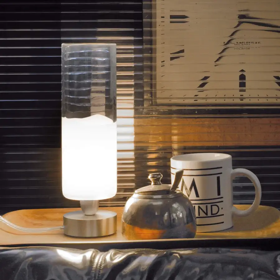 Superior Vistosi Lio table lamp with translucent white glass and silver-toned metallic base crafted for ambient glow