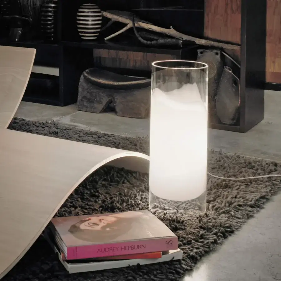 Exceptional Vistosi Lio table lamp crafted in transparent crystal glass with a satin metal base and opaque white band