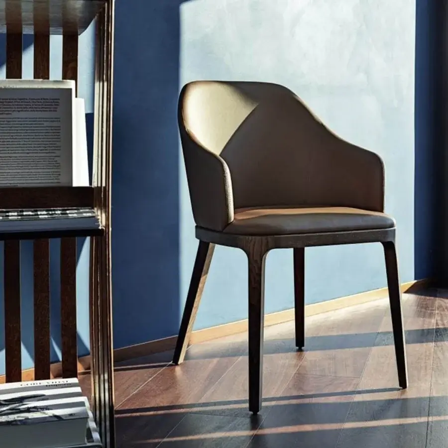 Distinguished Frag Doa dining chair with padded shell in muted taupe fabric and satin finished exposed ash wood frame