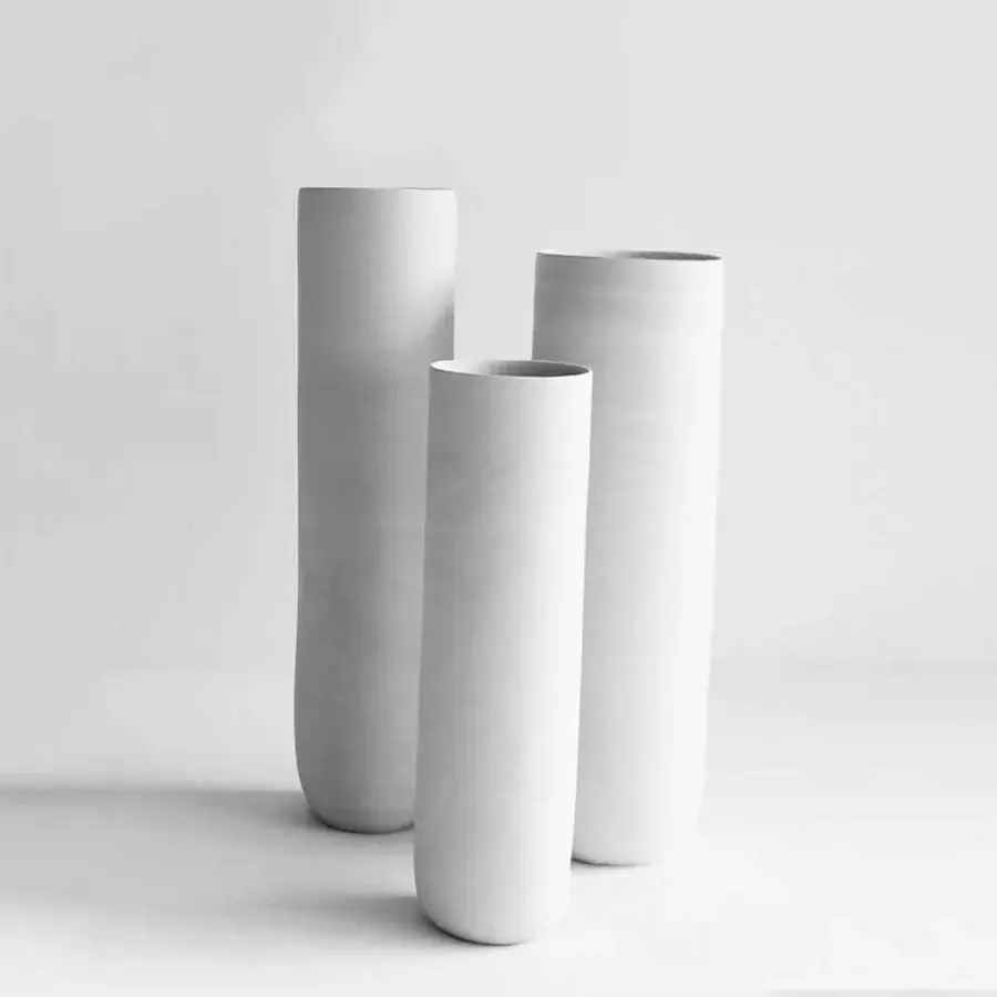 Superior Rina Menardi Canne vase set crafted from baked clay with a matte neutral gray finish and organic curves