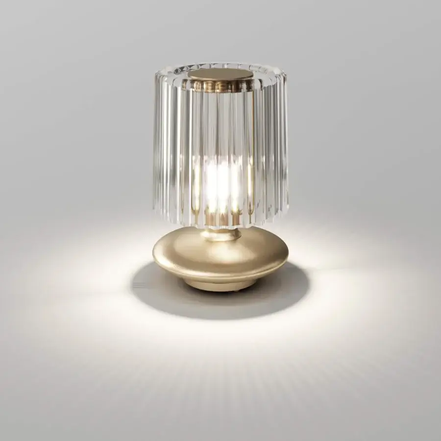 Distinguished Vistosi Tread lamp crafted in warm gold metal with hand-blown Murano glass exhibiting rhythmic grooves