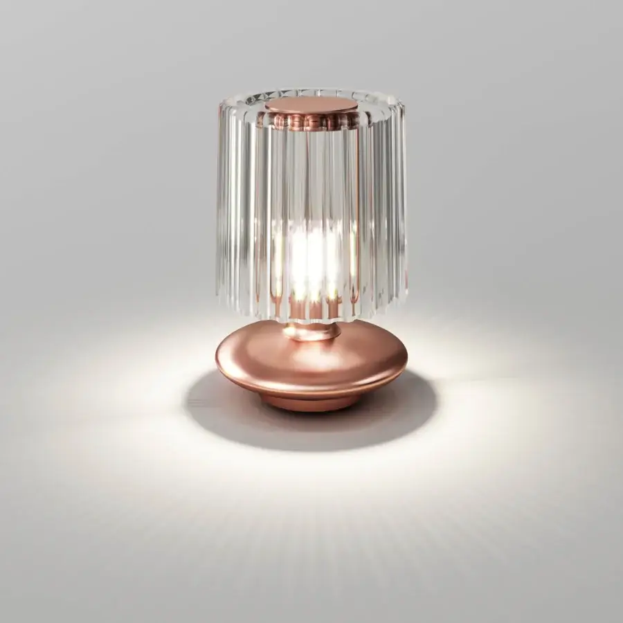 Avant-garde Vistosi Tread lamp crafted in rose-gold metal with vertically ribbed hand-blown Murano glass and glossy finish
