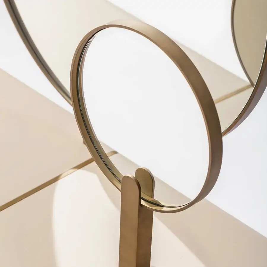 Distinguished Carpanese Home Althea V vanity balancing geometric lines with elegant curves crafted from metal with a warm muted gold finish