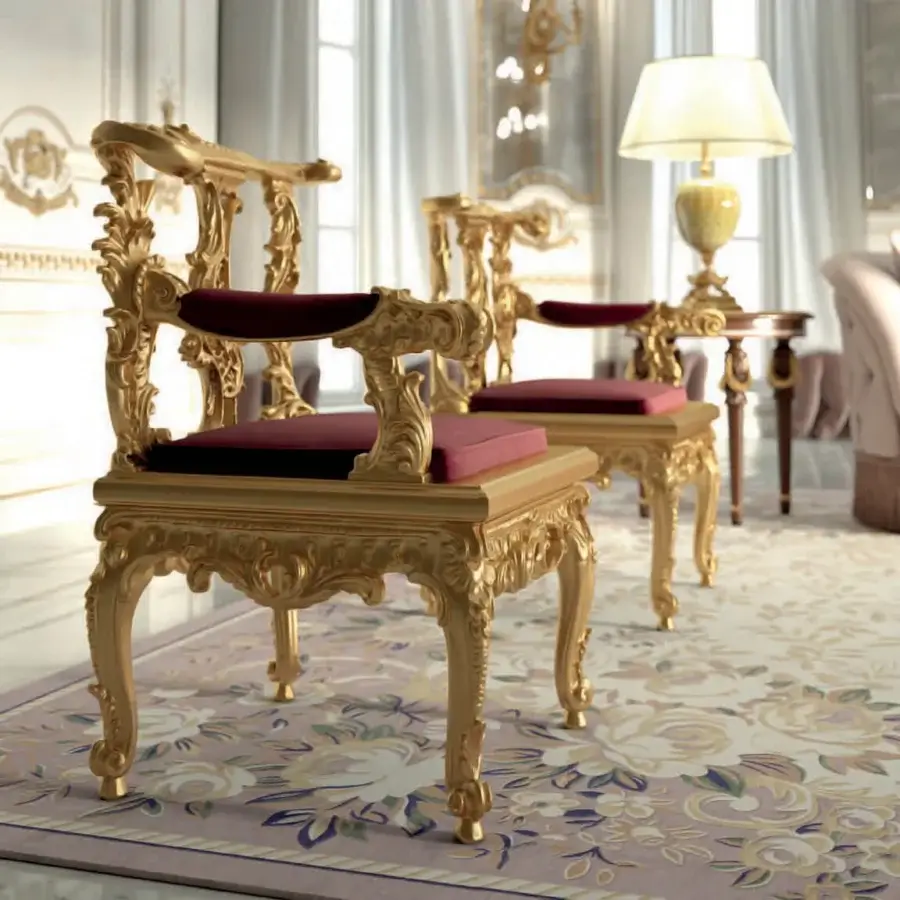 Lavish Armando Rho A1349 lounge chair crafted in burgundy upholstery with luminous gold leaf and ornate carvings