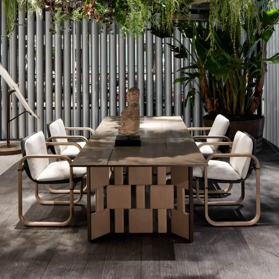 Exceptional Giorgetti Loop armchair with fluid lines, grey water-polished ash wood and carob aluminum accents, upholstered in off-white Eva rubber textile