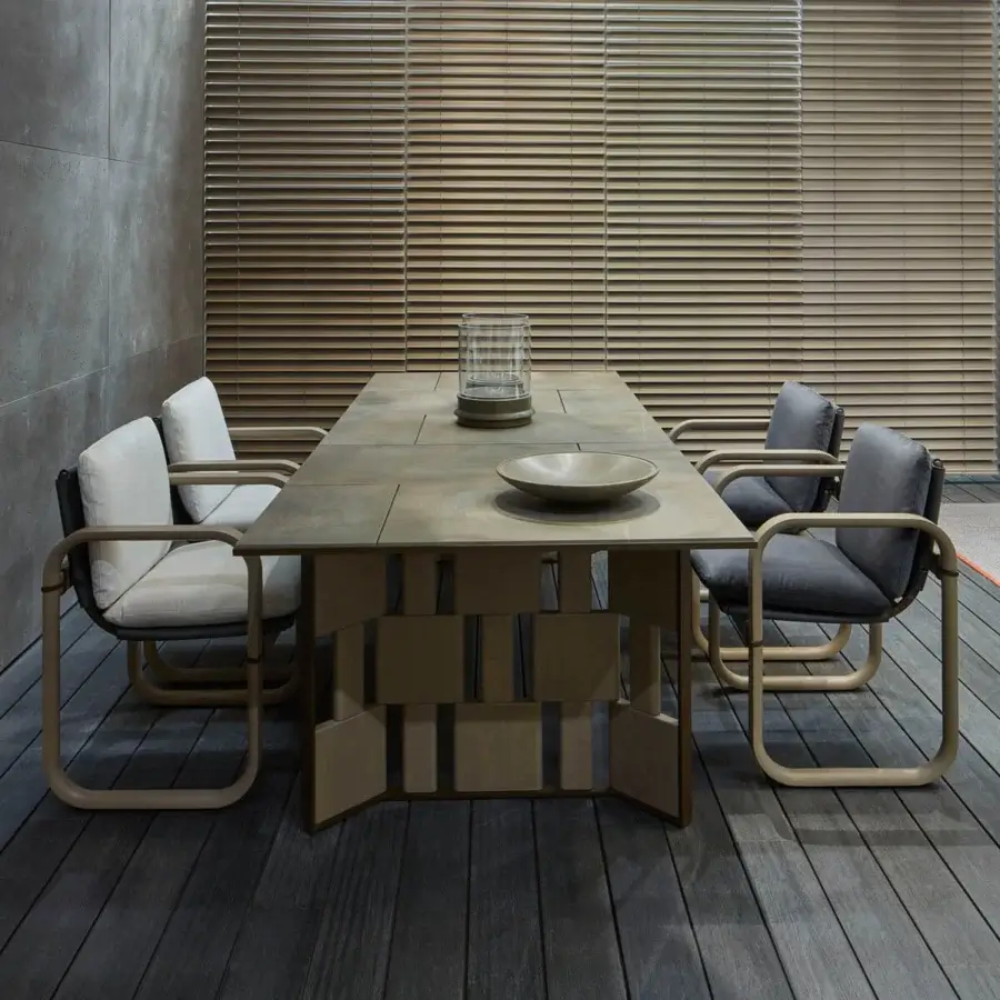 Elegant Giorgetti Loop armchair with fluid sculpted lines, grey water-polished ash wood and carob aluminum details, upholstered in light gray Eva rubber