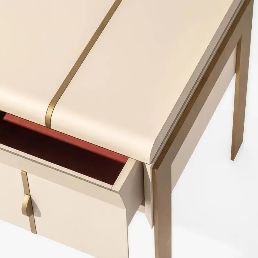 Exceptional Carpanese Home Althea N nightstand crafted in wood with glossy pale beige finish and satin brass metal inlay