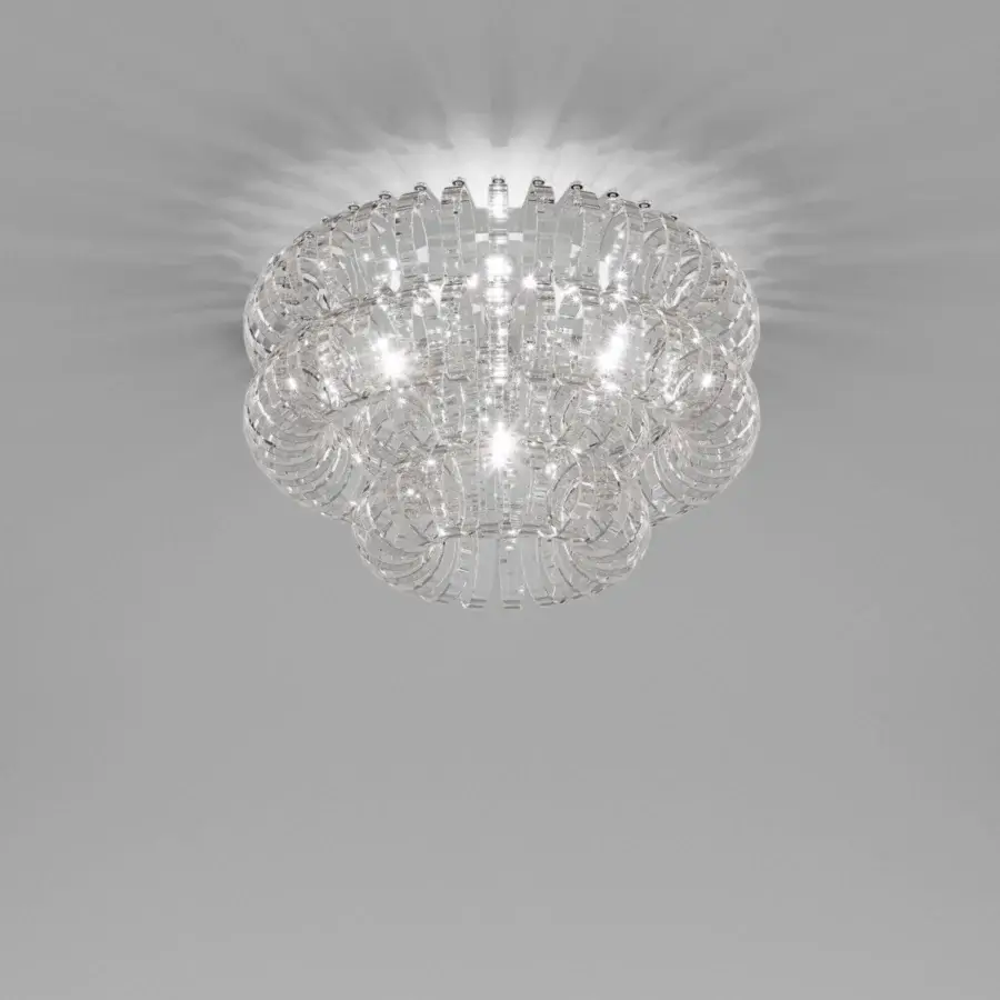 Distinguished Vistosi Ecos ceiling lamp crafted in clear hand-blown Murano glass with a signature rigadin texture and tiered structure