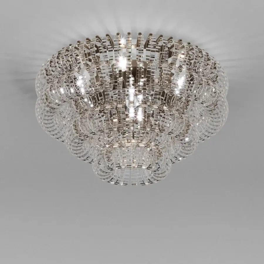 Exceptional Vistosi Ecos ceiling lamp crafted in clear hand-blown Murano glass with polished metal and rigadin texture