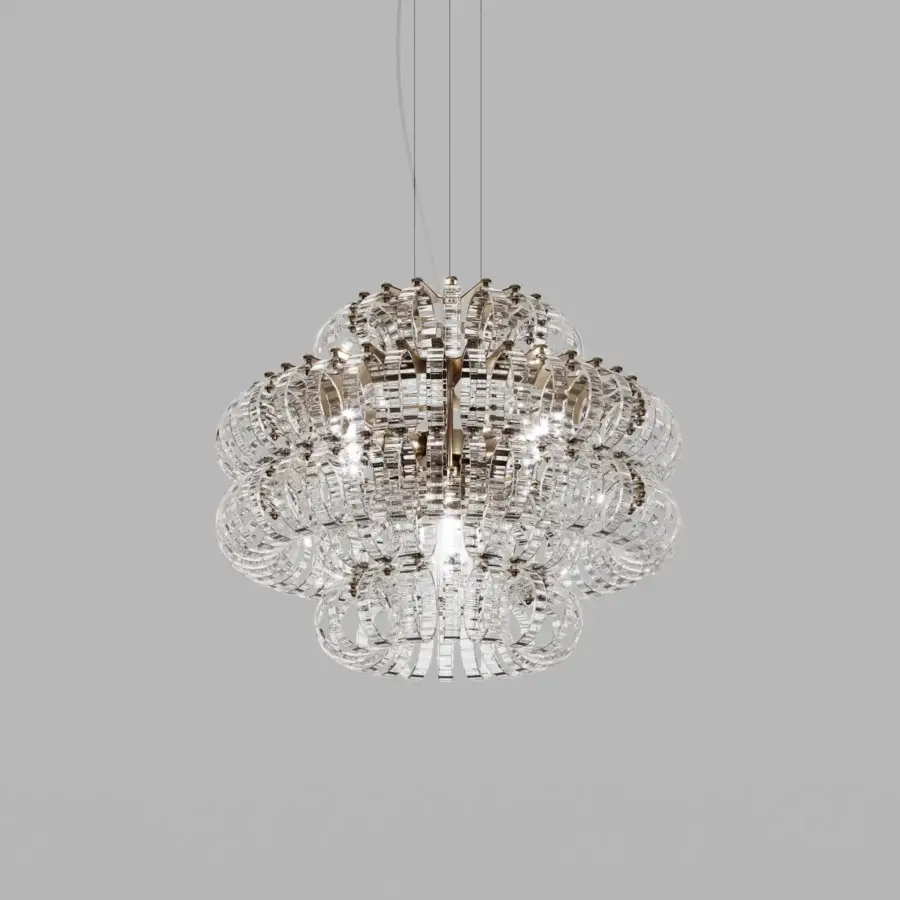Distinguished Vistosi Ecos suspension lamp crafted in clear hand-blown Murano glass with a polished gold-toned metallic core and rigadin texture