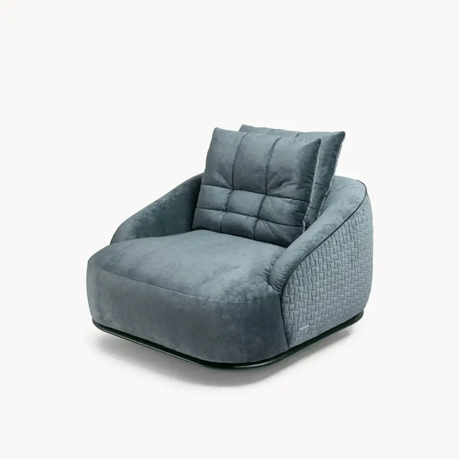 Superior Visionnaire Holden lounge chair with muted blue-grey textile upholstery and refined perimetral trim