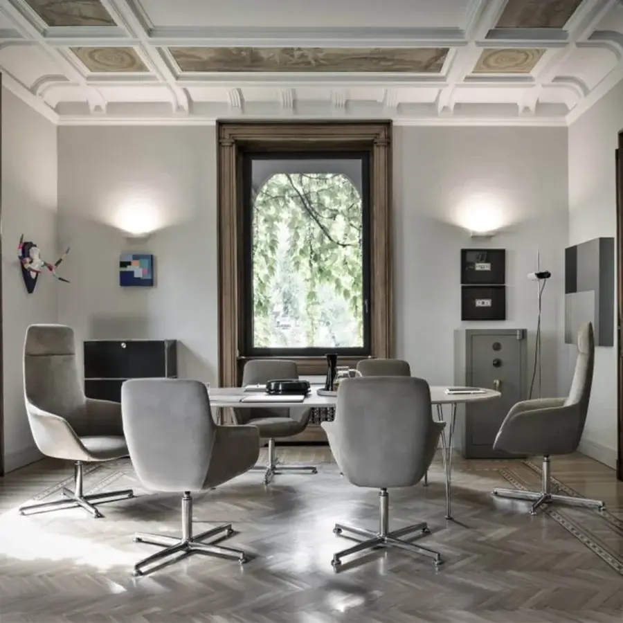 Distinguished Mea Office armchair in muted gray leather with polished metal elements and a five-spoke adjustable base