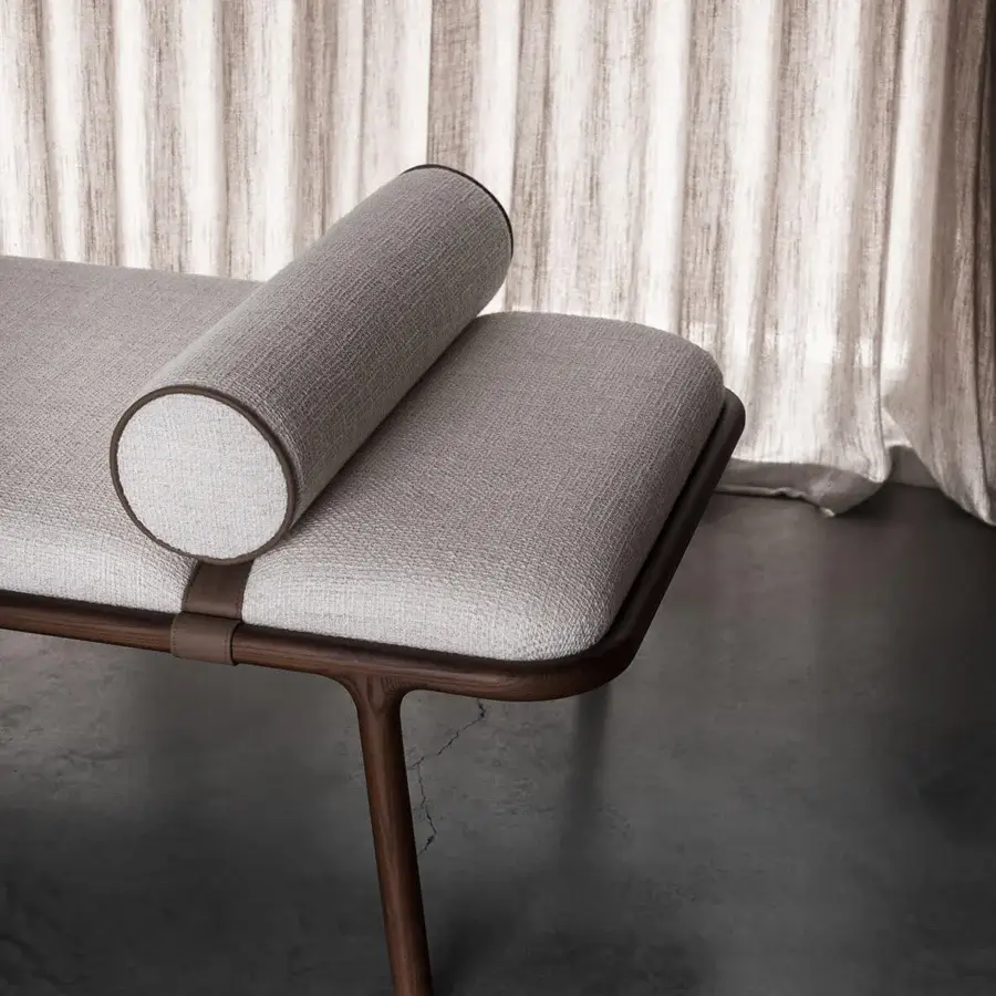 Distinguished Carpanese Home Belts bench built with satin-finish wood and neutral beige textile upholstery with leather straps
