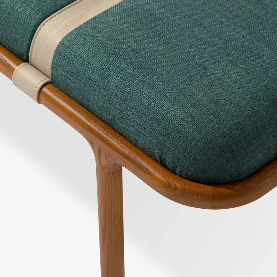 Exceptional Carpanese Home Belts bench crafted with warm wood and a plush deep teal textile seat with lighter detailing