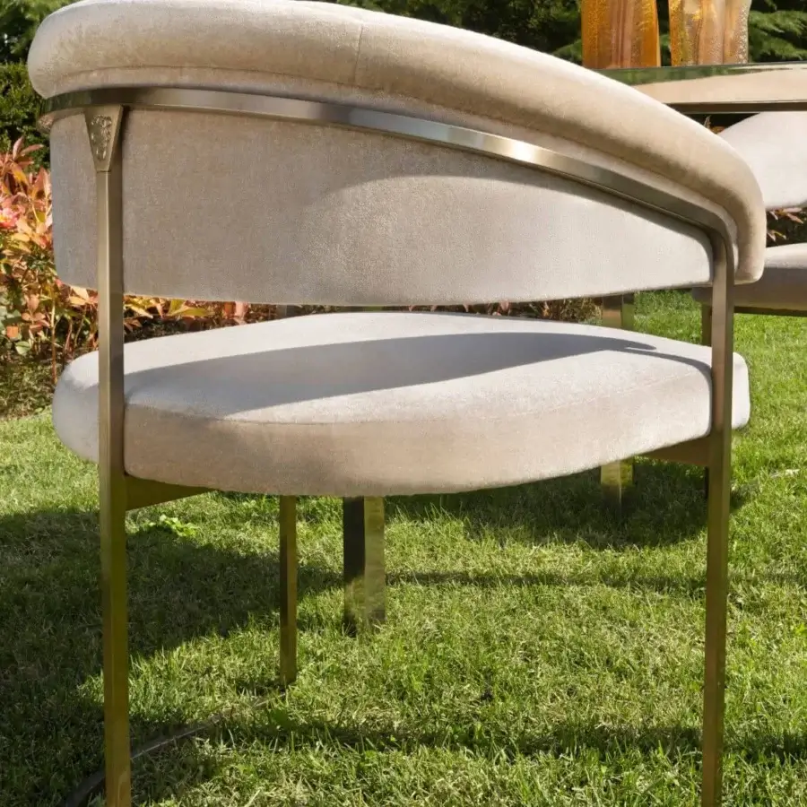 Captivating Visionnaire Clem Outdoor armchair with a squared brass pipe frame and neutral beige textile upholstery