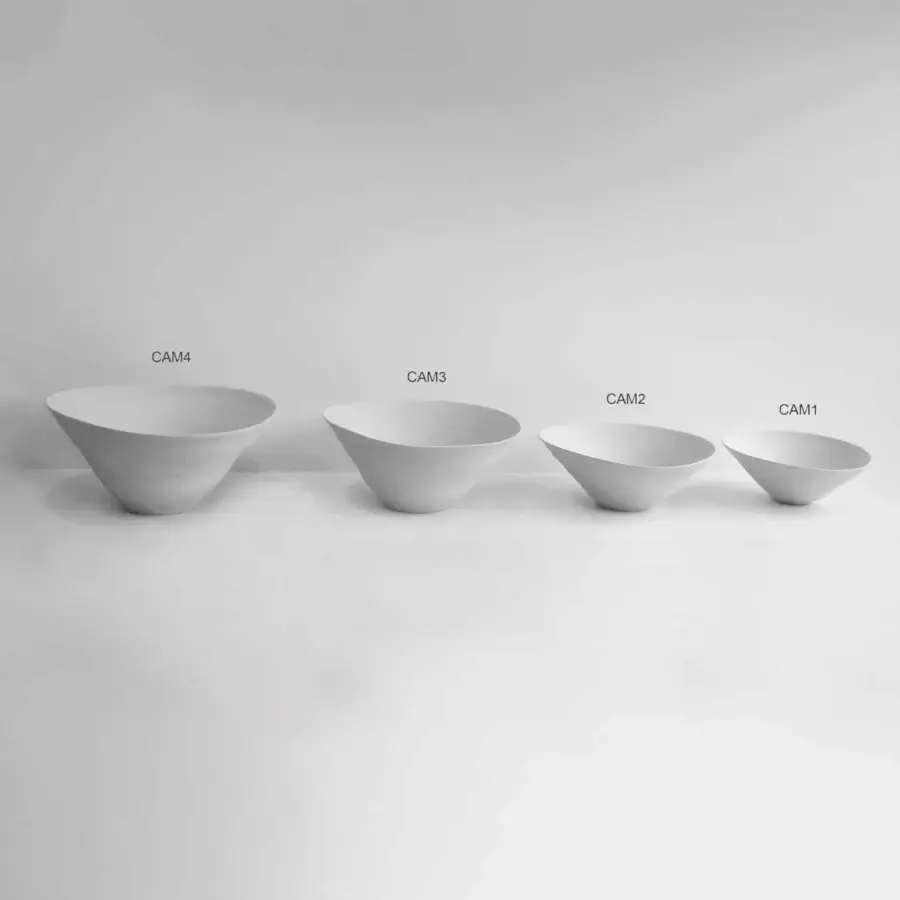 Elegant Rina Menardi Campanelle centerpiece set with baked clay vessels and subtly textured matte finish
