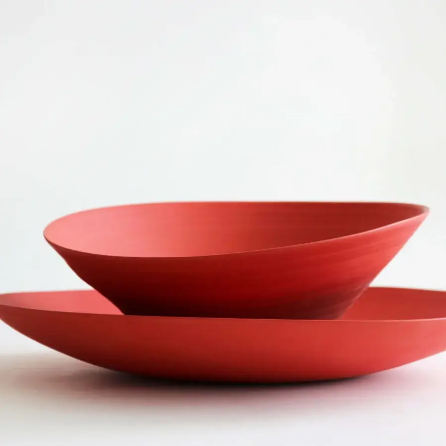 Exclusive Rina Menardi Campanelle centerpiece crafted in baked clay with warm red hues and a matte finish