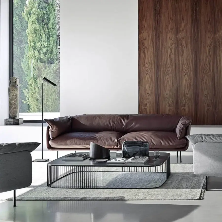 Superior Frag Winnie sofa upholstered in warm brown premium leather with gently curved arms and refined lines