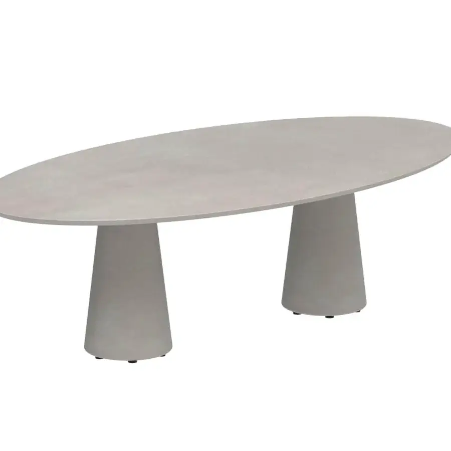 Exceptional Royal Botania Conix table with light gray concrete top and conical fibre-reinforced bases with polished surface
