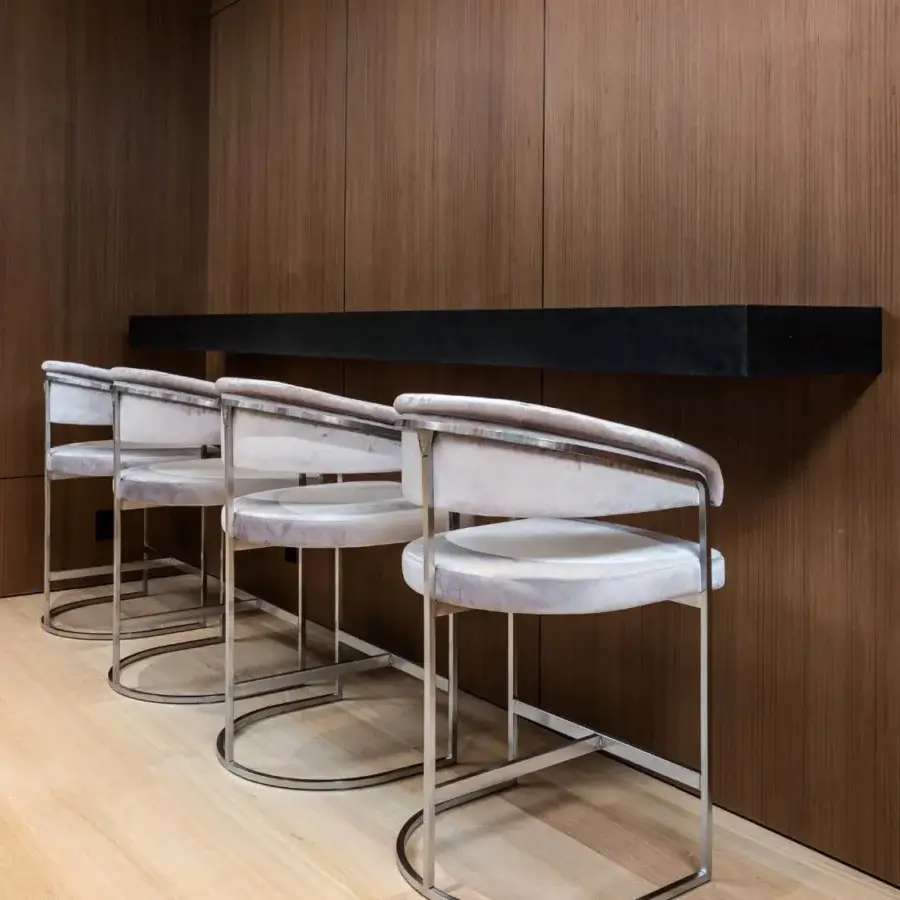 Exceptional Visionnaire Clem stool crafted with pale gray textile upholstery and a squared brass pipe frame with polished finish