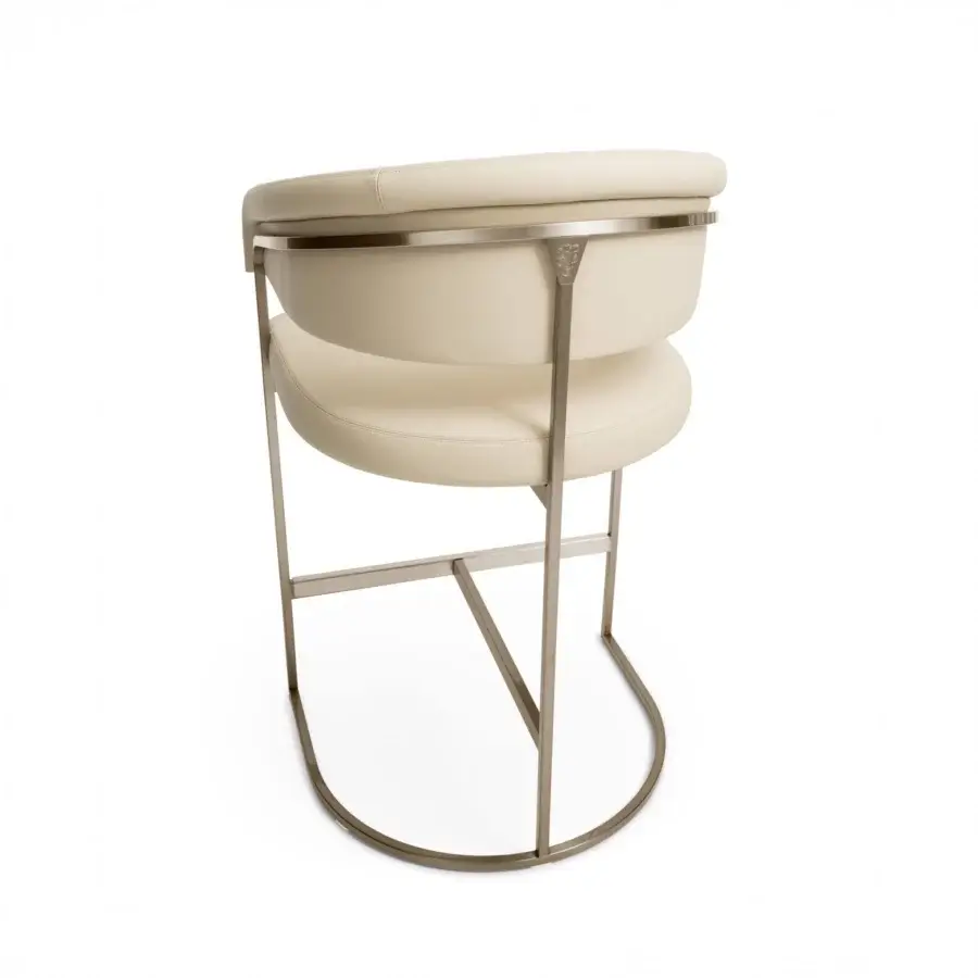 Superior Visionnaire Clem stool with a squared brass pipe frame and light beige polyurethane seat built for lasting comfort