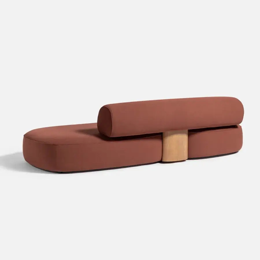 Elegant Carpanese Home Slow sofa with terracotta textile upholstery and exposed ash wood support