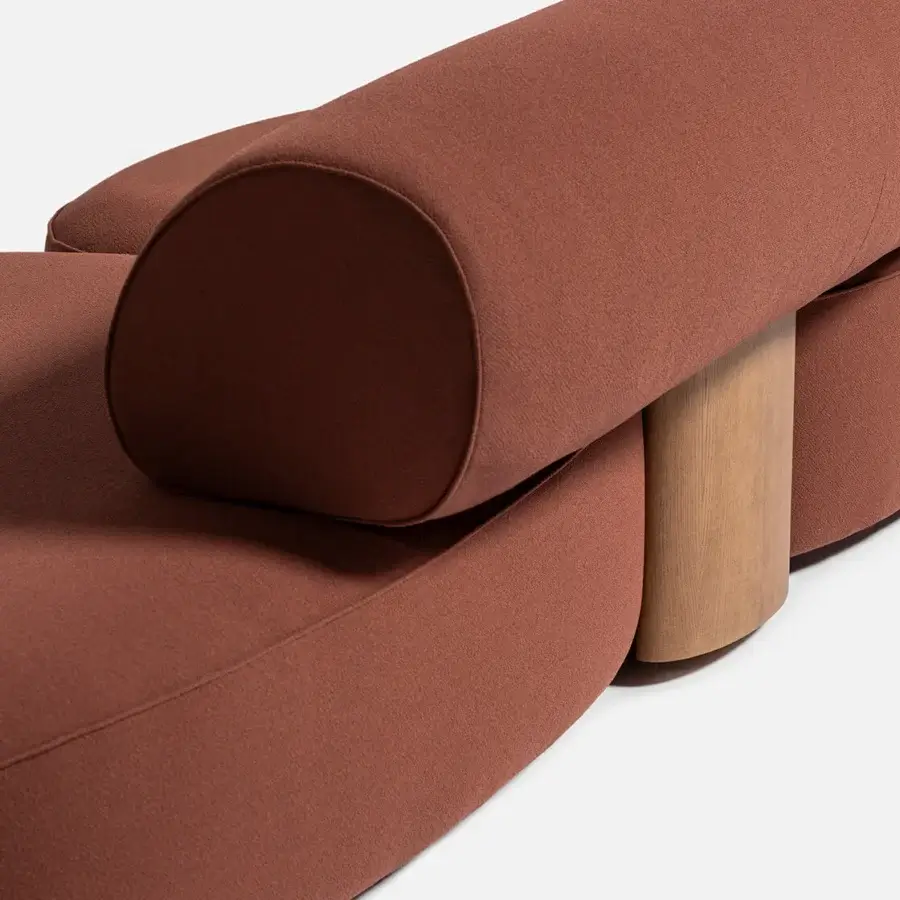 Distinguished Carpanese Home Slow sofa with muted terracotta textile upholstery and exposed ash wood supports crafted from EPA-certified plywood