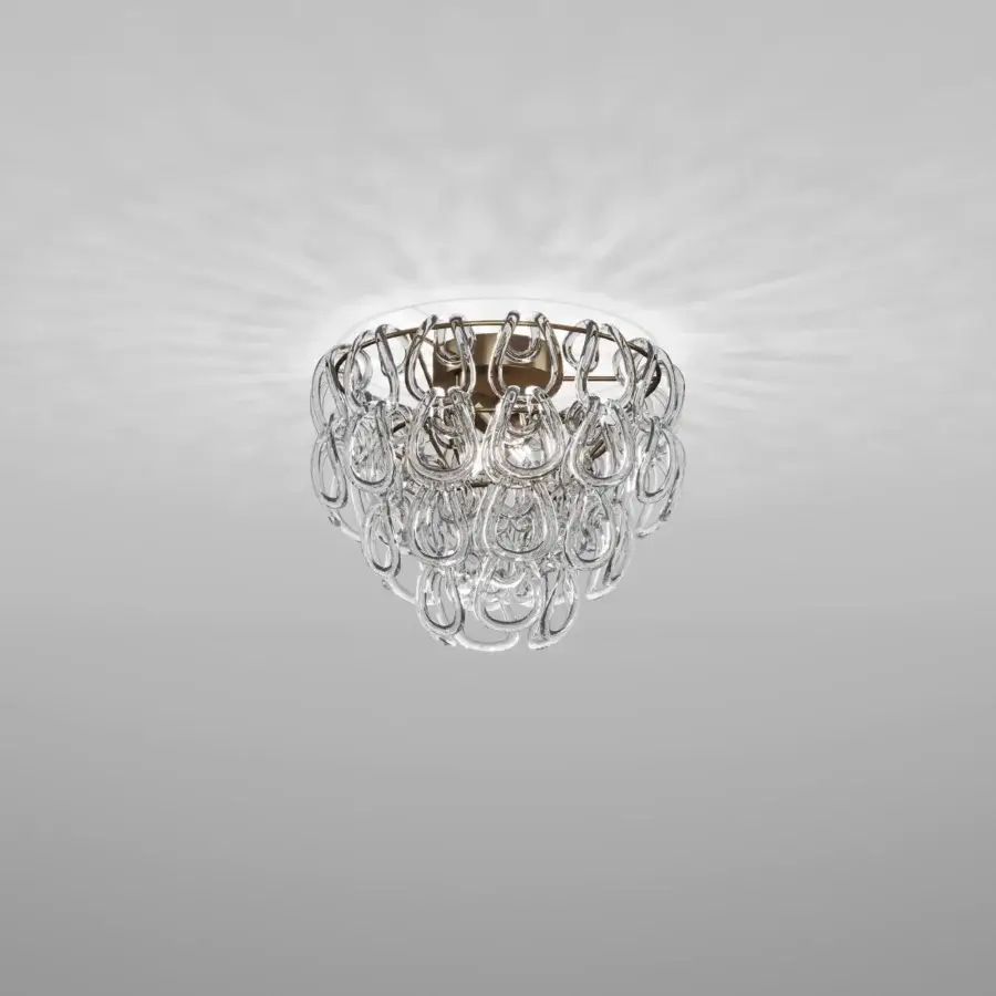 Exceptional Vistosi Giogali ceiling lamp crafted in clear glass with interlocking hooks and golden metallic accents