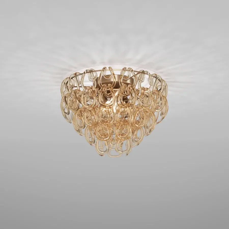 Distinguished Vistosi Giogali ceiling lamp crafted in interconnected hand-blown glass with a warm gold finish for radiant illumination