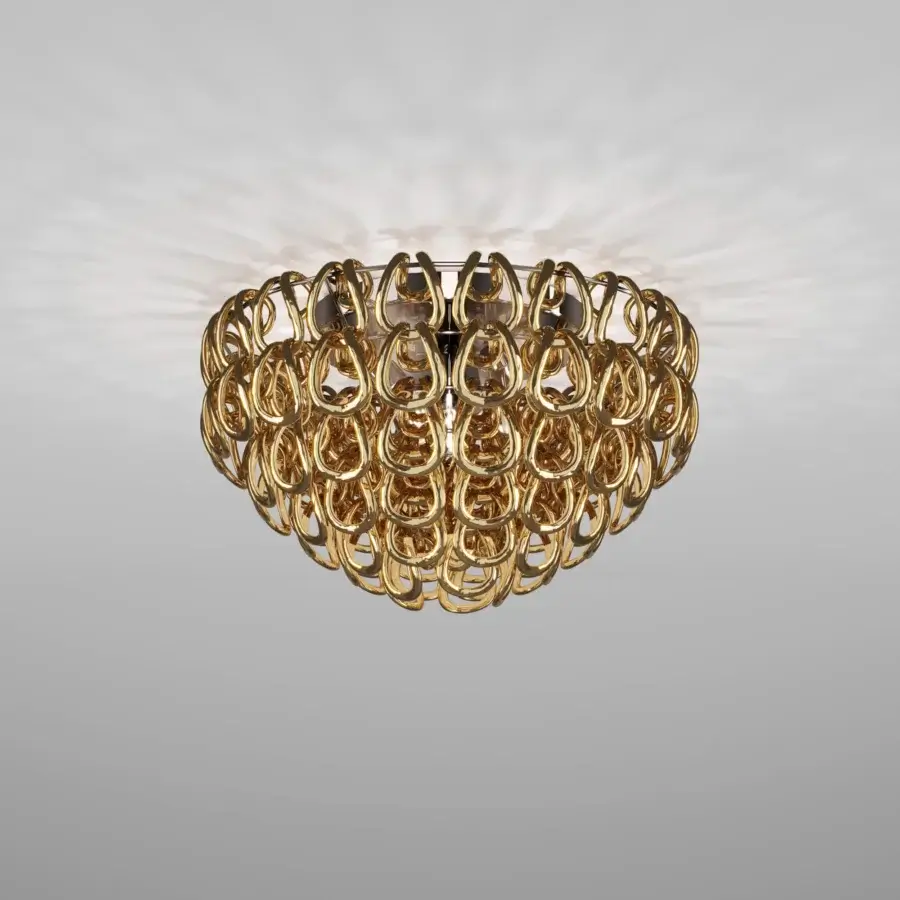 Lavish Vistosi Giogali ceiling lamp handcrafted in interlocking hand-blown glass and metal with a rich gold tone