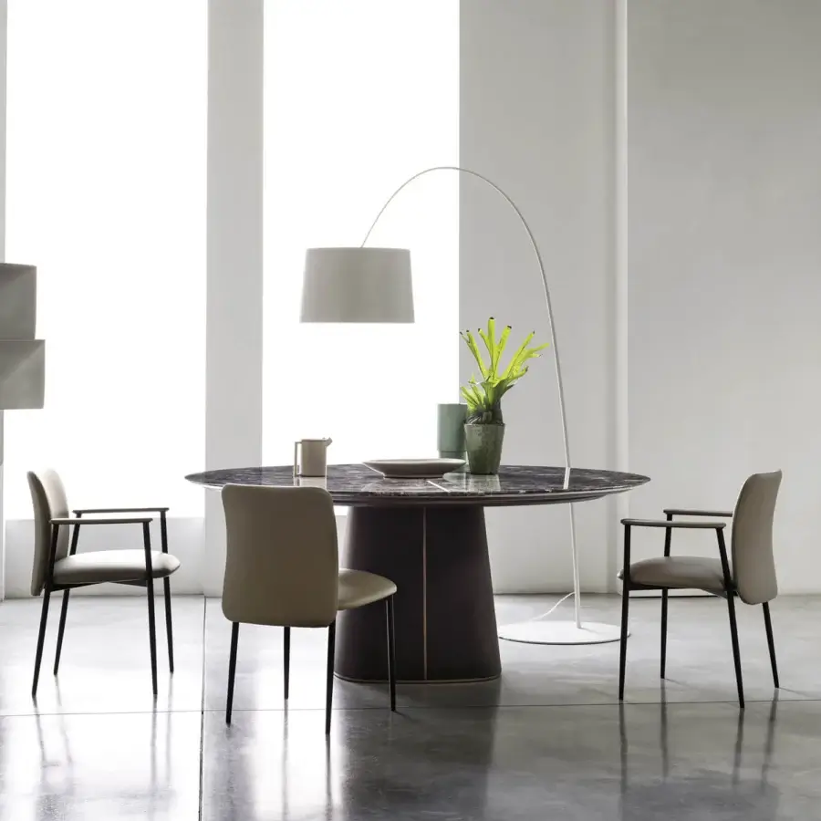 Exceptional Frag Artù dining table in polished marble with dark grey veining and satin dark brown leather upholstery